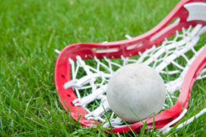 Girls lacrosse stick with ball